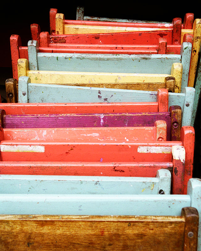 Folding Chairs pastel colors, Leaning Against the Wall Photo