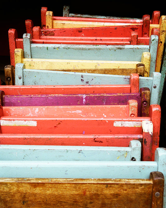 Folding Chairs pastel colors, Leaning Against the Wall Photo