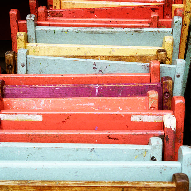 Folding Chairs pastel colors, Leaning Against the Wall Photo
