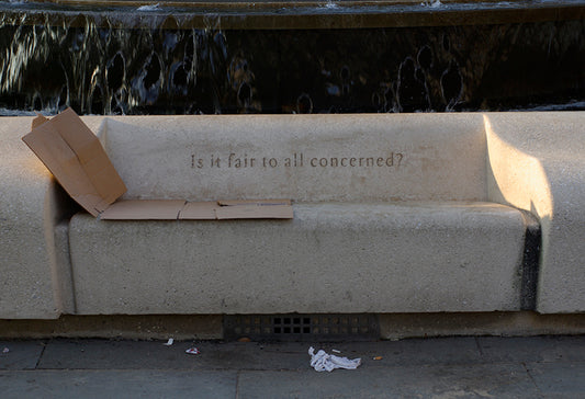 The hard bed of a homeless person by John Harmon