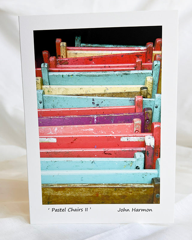 Folding Chairs pastel colors, Leaning Against the Wall Photo