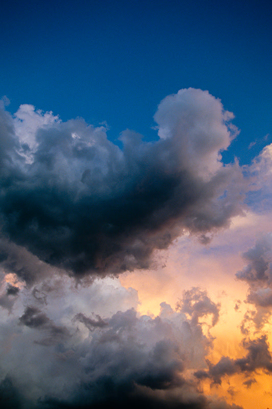 A Spiritual Fine Art Print Featuring an Angel-Shaped Cloud Ascending a Stormy Sky