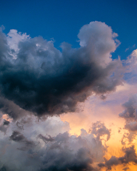 A Spiritual Fine Art Print Featuring an Angel-Shaped Cloud Ascending a Stormy Sky