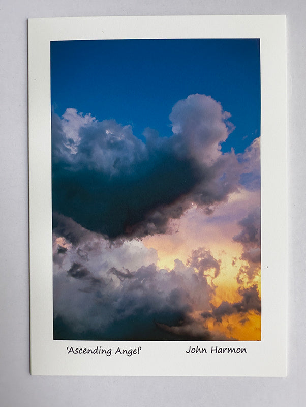 A Spiritual Fine Art Print Featuring an Angel-Shaped Cloud Ascending a Stormy Sky