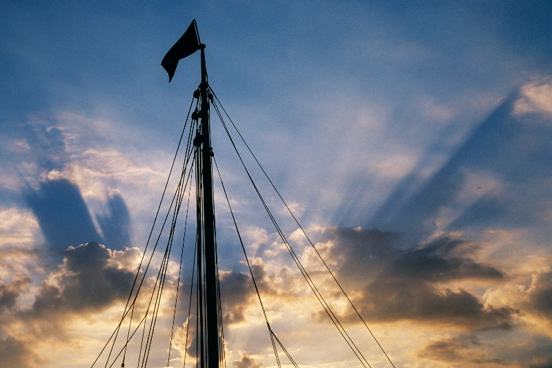 Sailors Blessing Artistic interaction of a mast and sky on a classic woodem sailboat Fine Art Photo