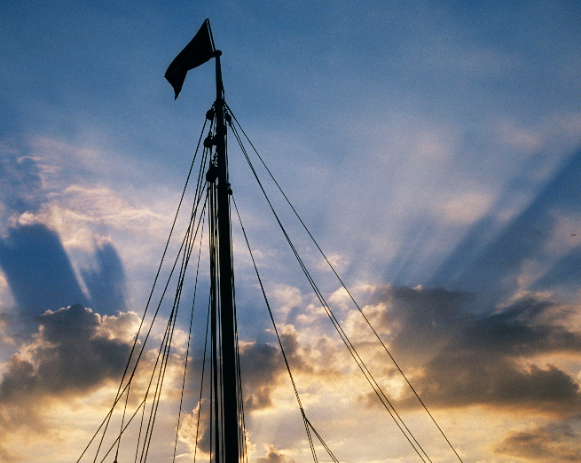 Sailors Blessing Artistic interaction of a mast and sky on a classic woodem sailboat Fine Art Photo