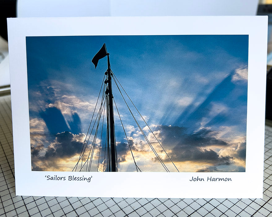 Sailors Blessing Artistic interaction of a mast and sky on a classic woodem sailboat Fine Art Photo